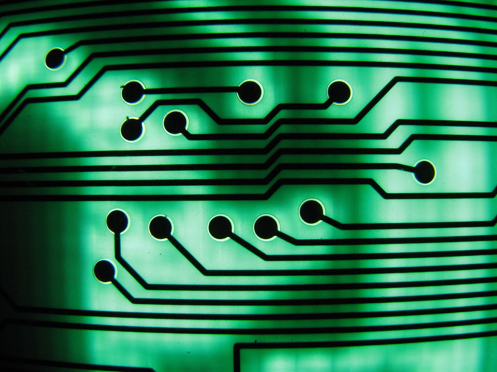 Macro photograph of a green circuit board